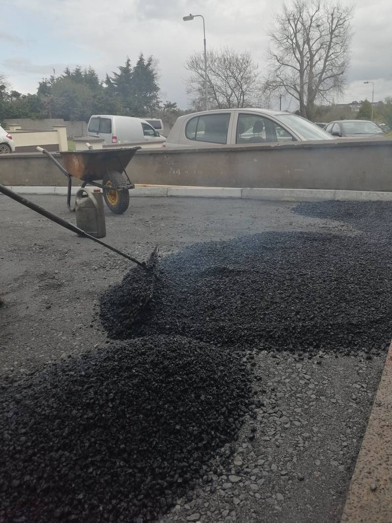 Ardnore: heaps of tarmac spread by hand across the base