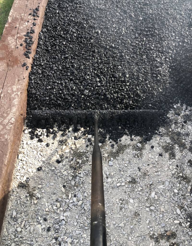 Raking hot tarmac tight to a timber edge