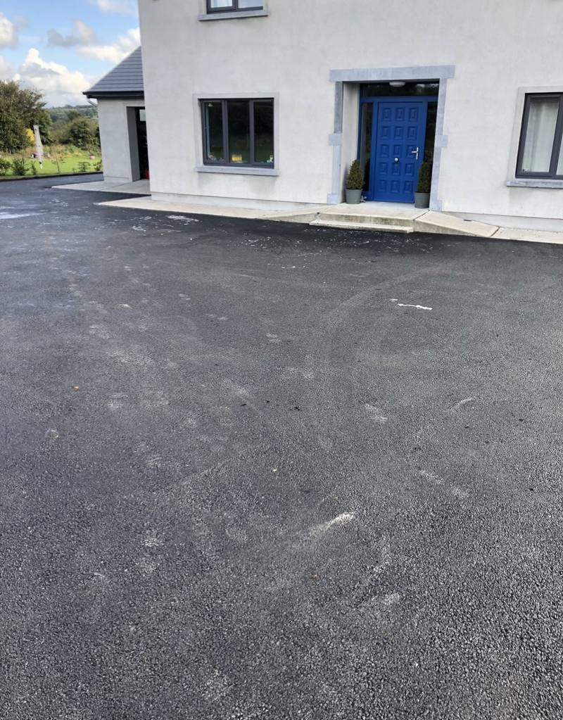 New tarmac up to the front door of a house