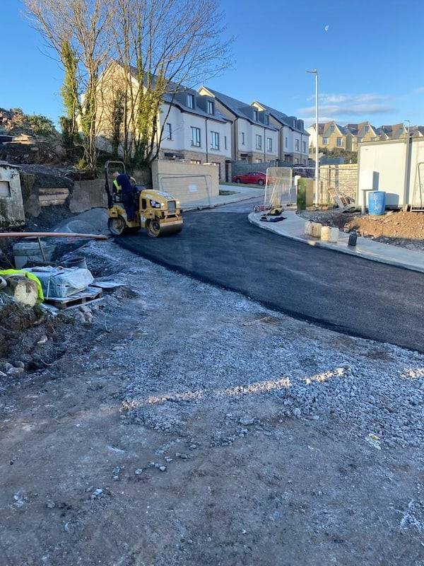 Housing estate job: rolling past the new houses