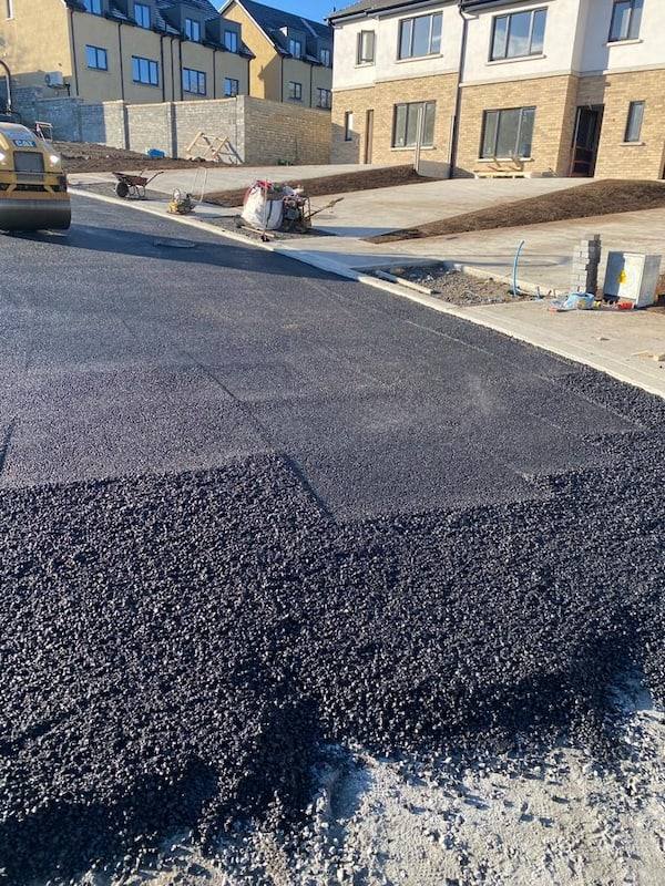 Housing estate job: new tarmac going down