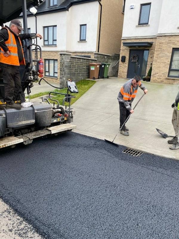 Housing estate job: hand finishing at a gully