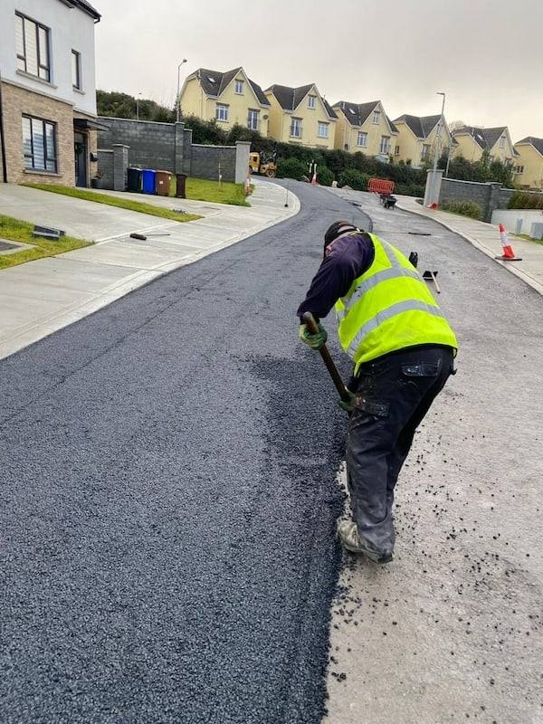 Housing estate job: raking the edge