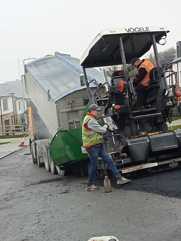 Housing estate job: the lorry feeding the paver