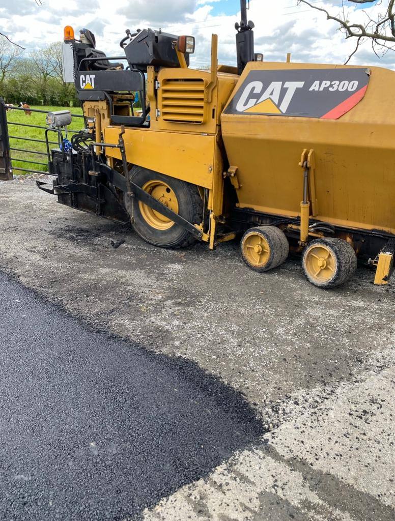 The paver laying new tarmac