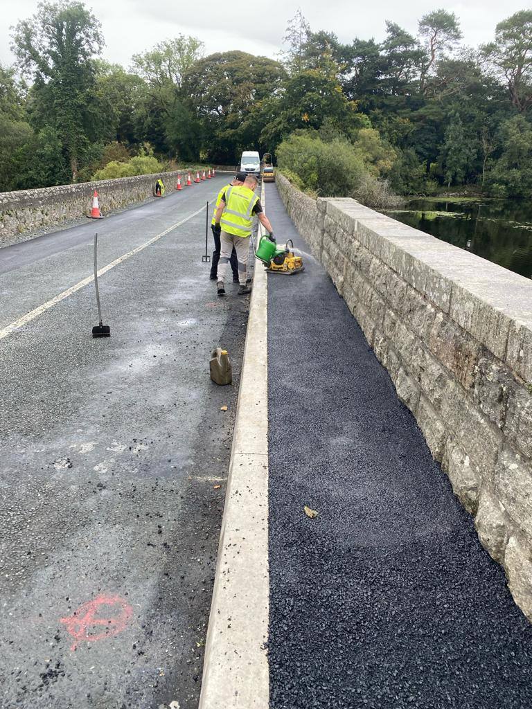 Footpaths job in Wicklow: laying the path on the bridge